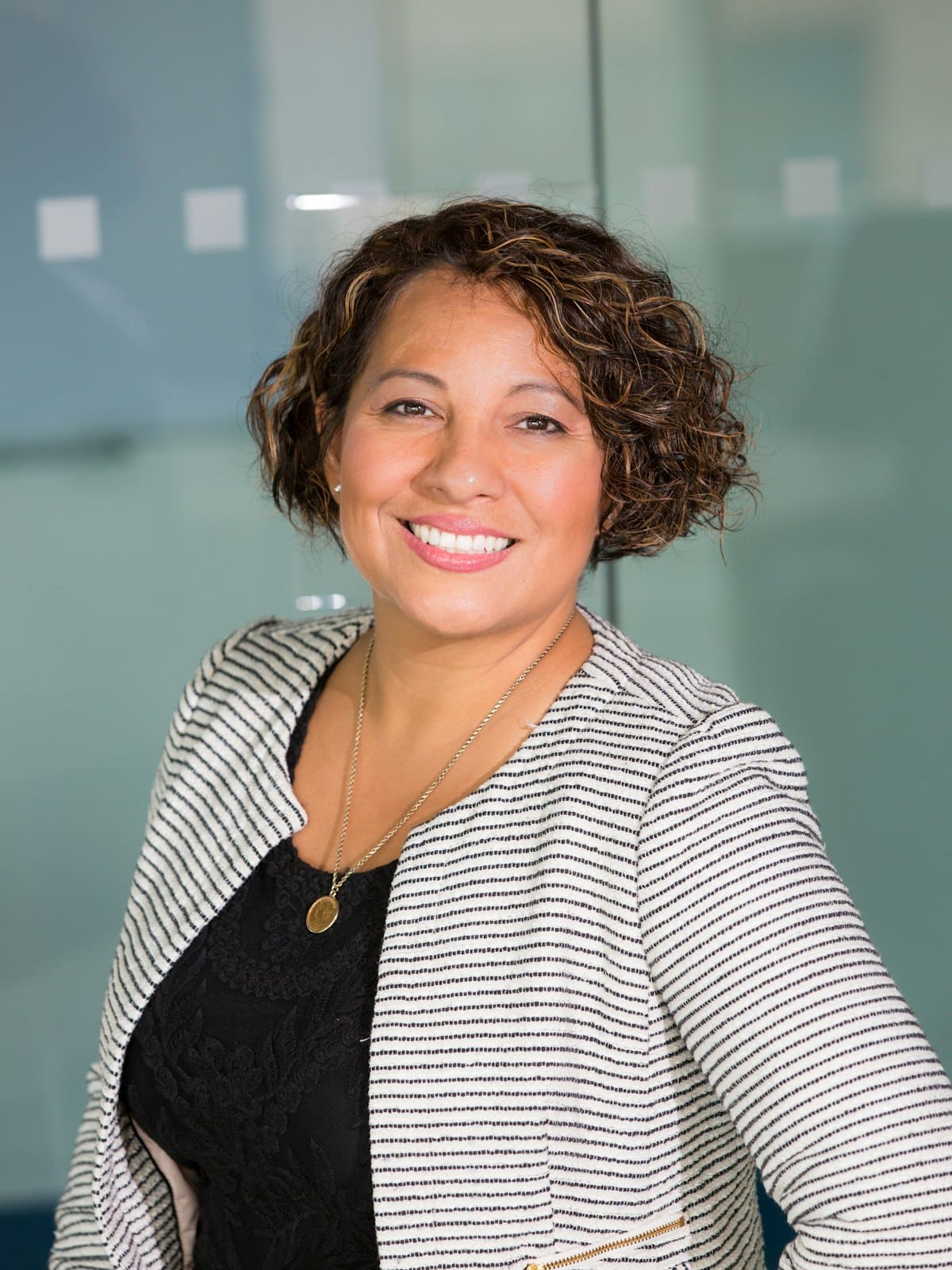 A business owner considering how customers find her company online