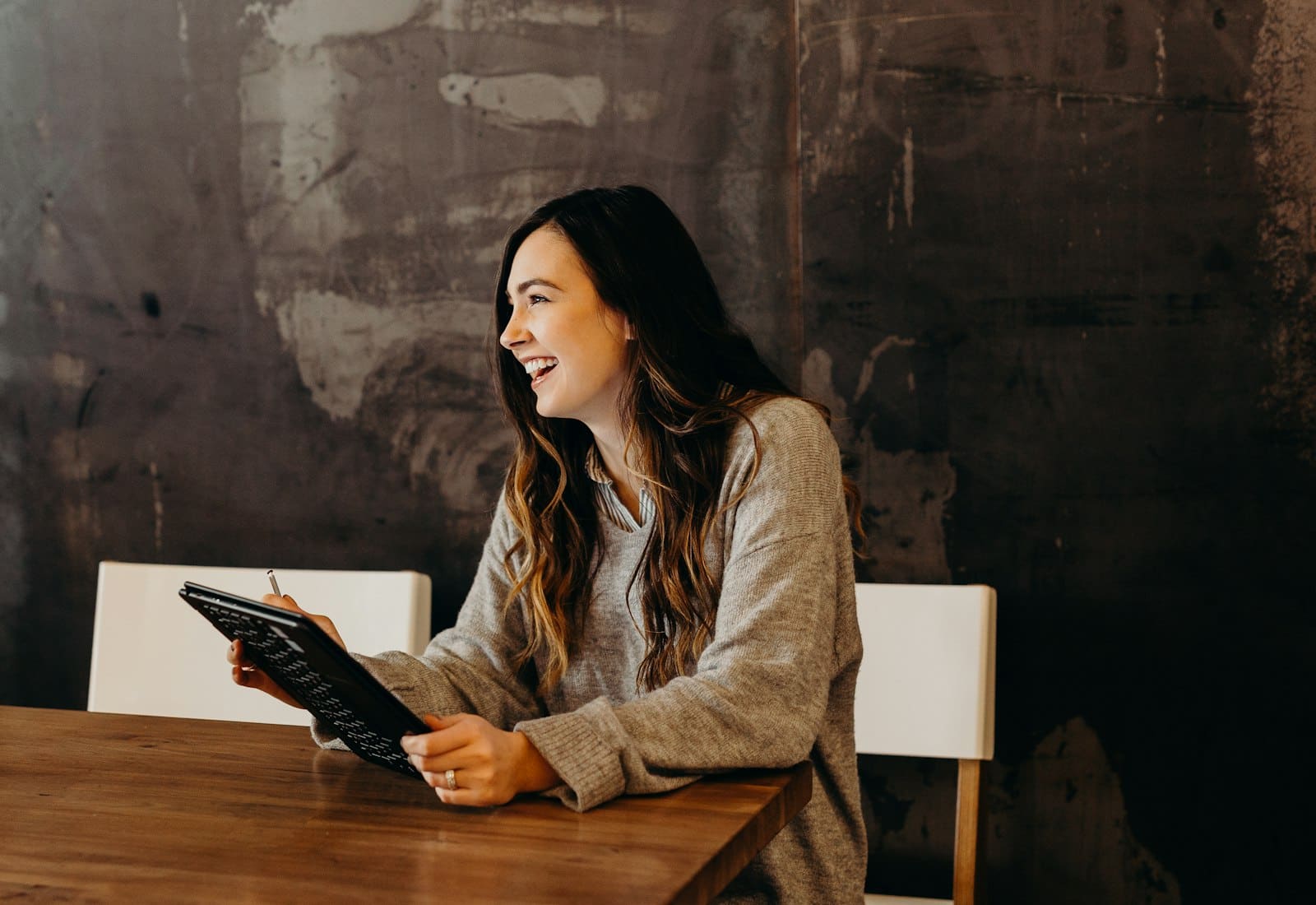 A restaurant operator reviewing the day on a tablet