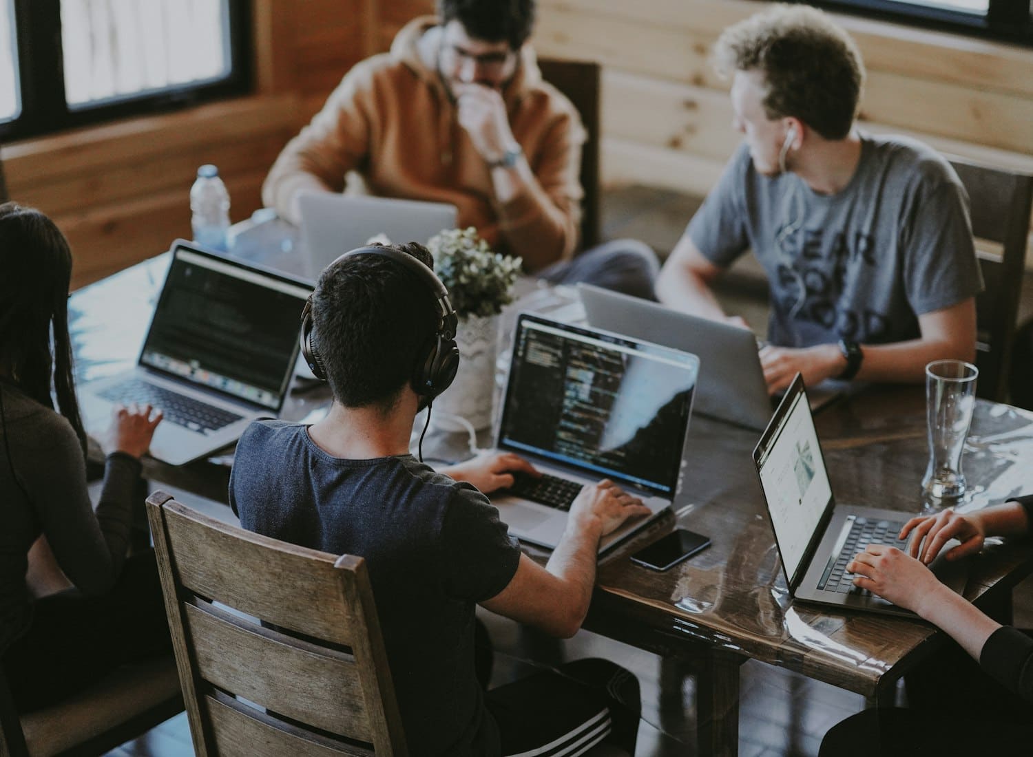 The CodeBuzzers team working through a build together