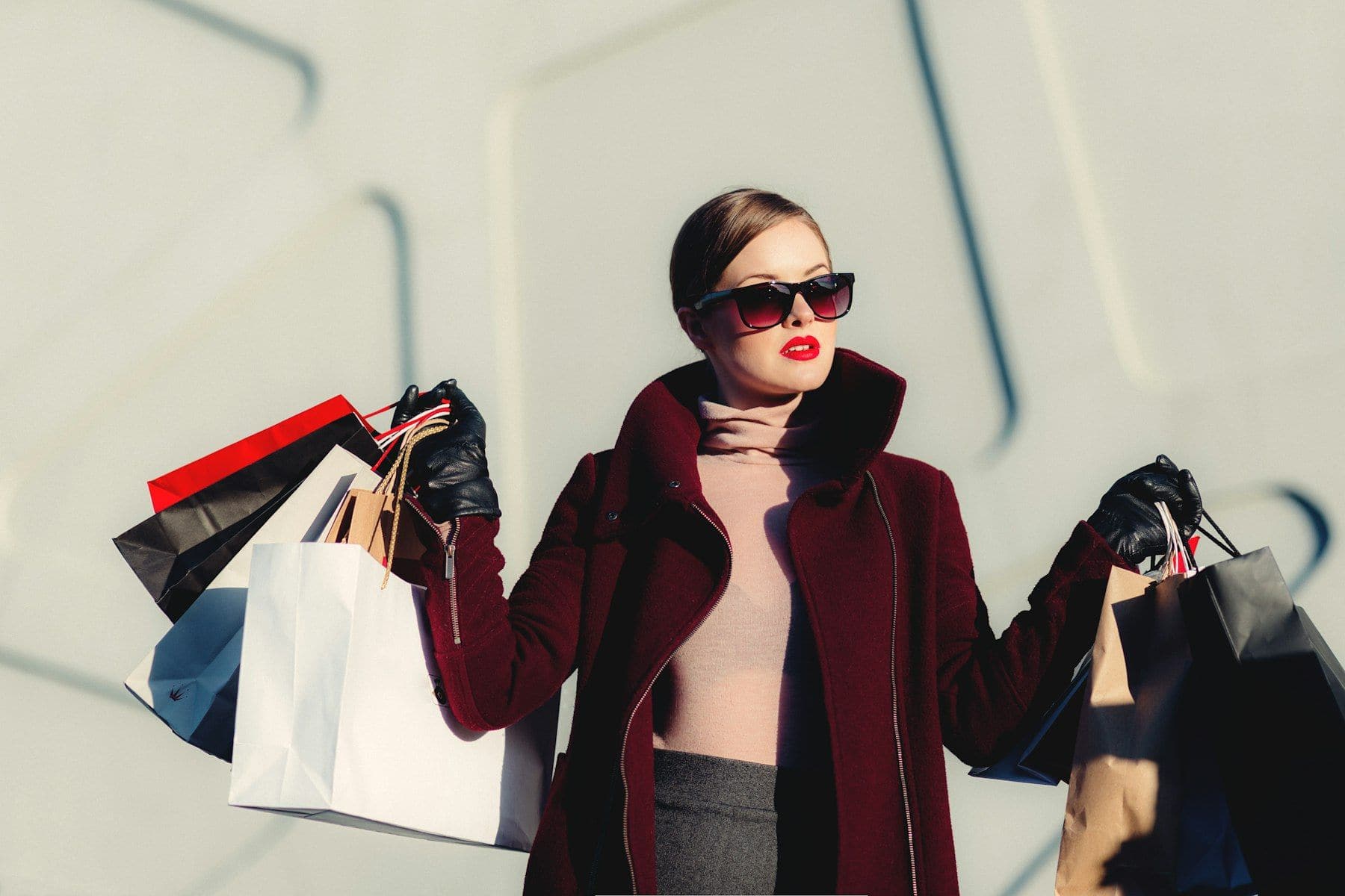 Shopper carrying bags after buying from an online store