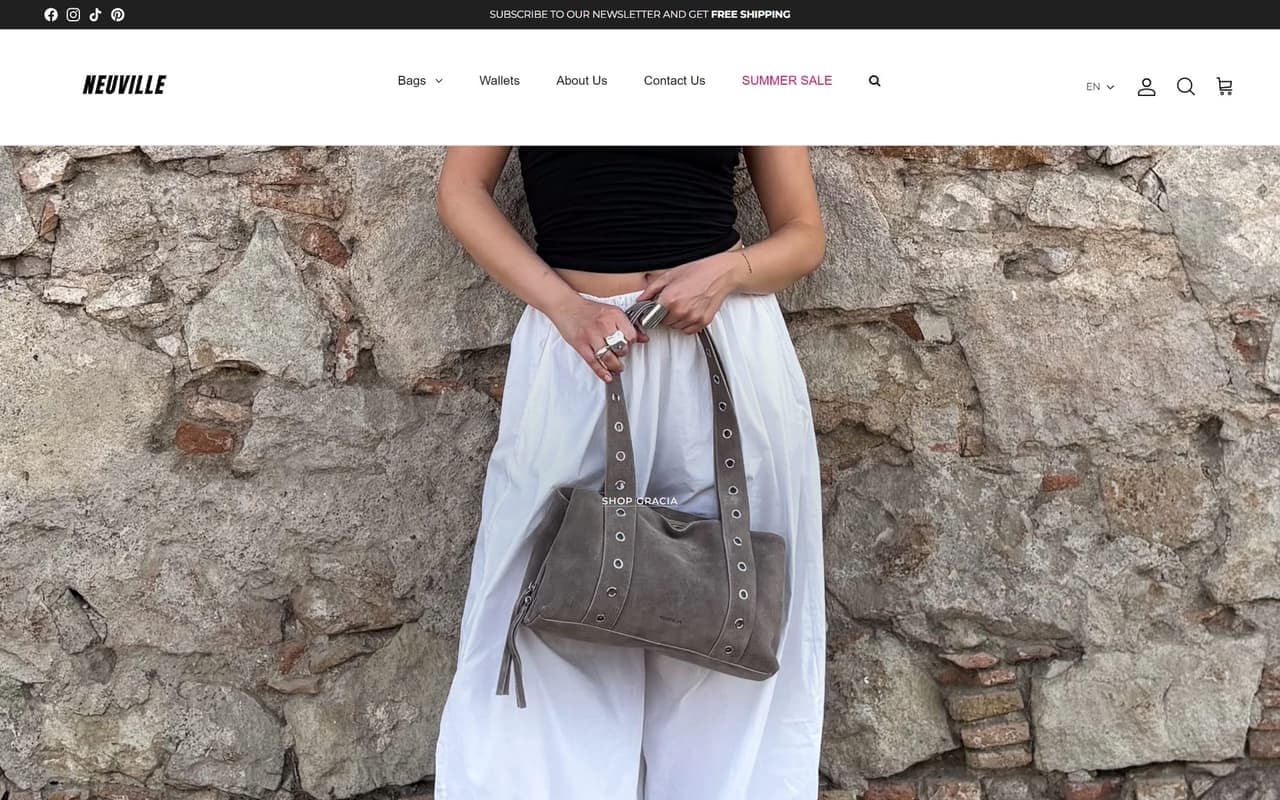 Neuville storefront homepage showing a leather shoulder bag and the bags, wallets and language menu