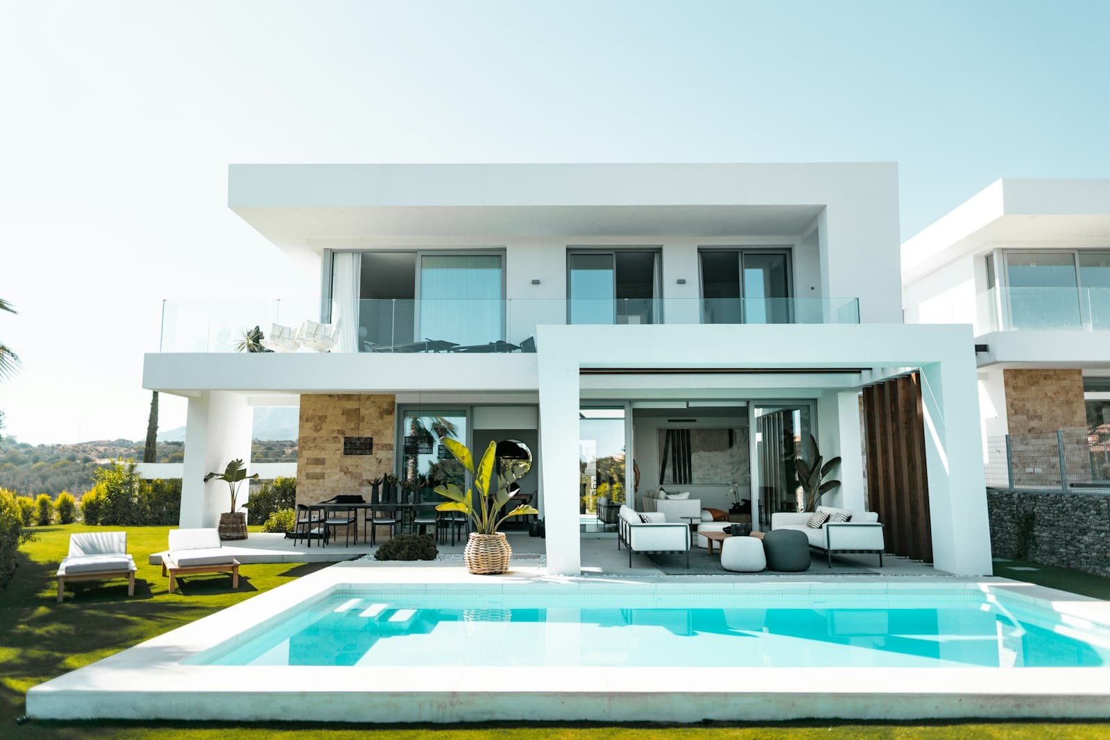 Contemporary luxury villa exterior at golden hour